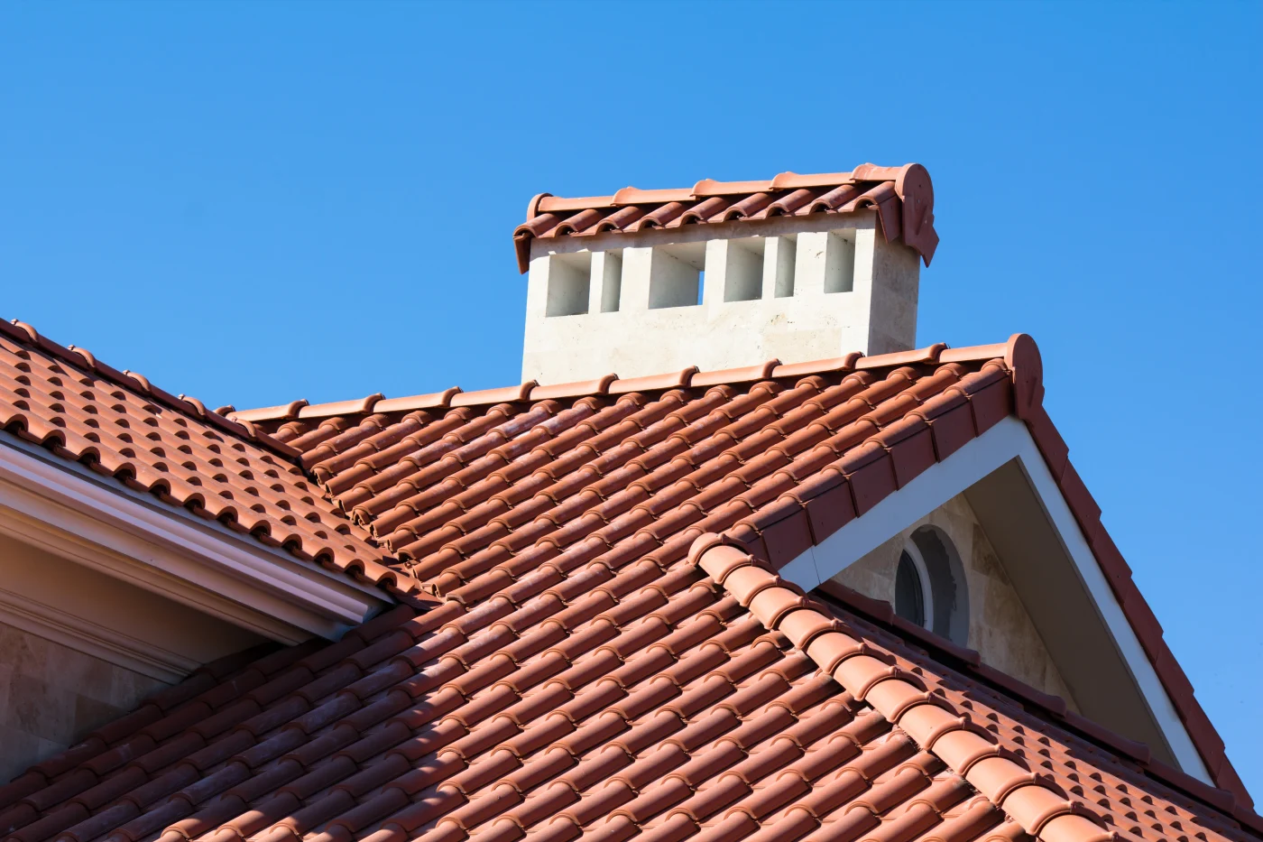 Home in Houston with a fire-resistant ceramic tile roof installed by Brinkmann Quality Roofing.