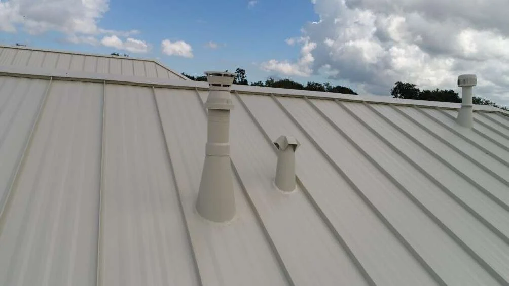 Close view of two different sections of a Houston-area metal roof replacement