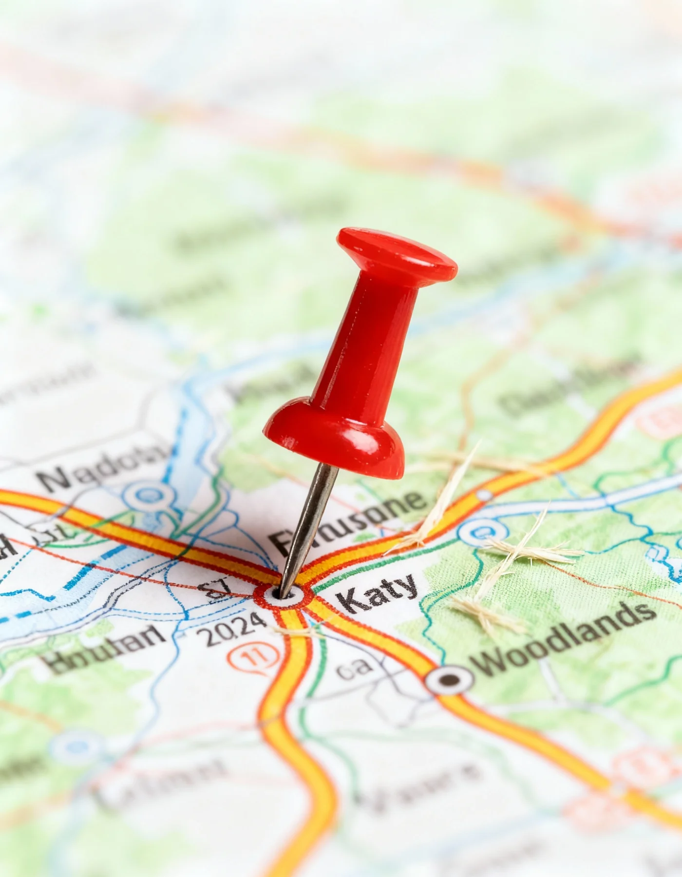 Local Matters For Houston Area Roofing | Brinkmann Quality Roofing Services A road map with a red tack sticking out of the Houston area.