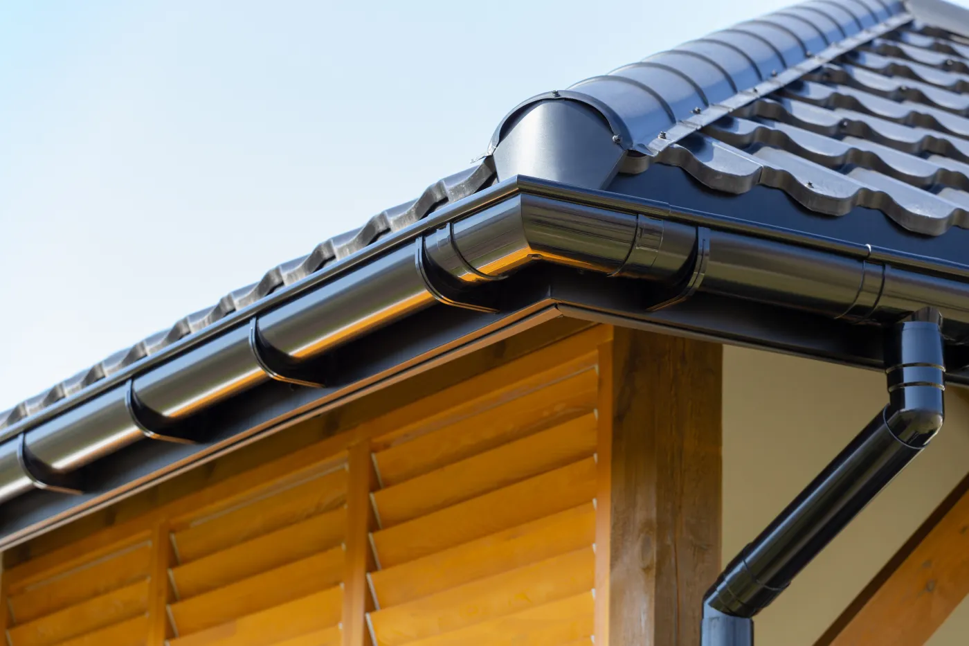 matte black gutter seamless houston texas brinkmann roofing