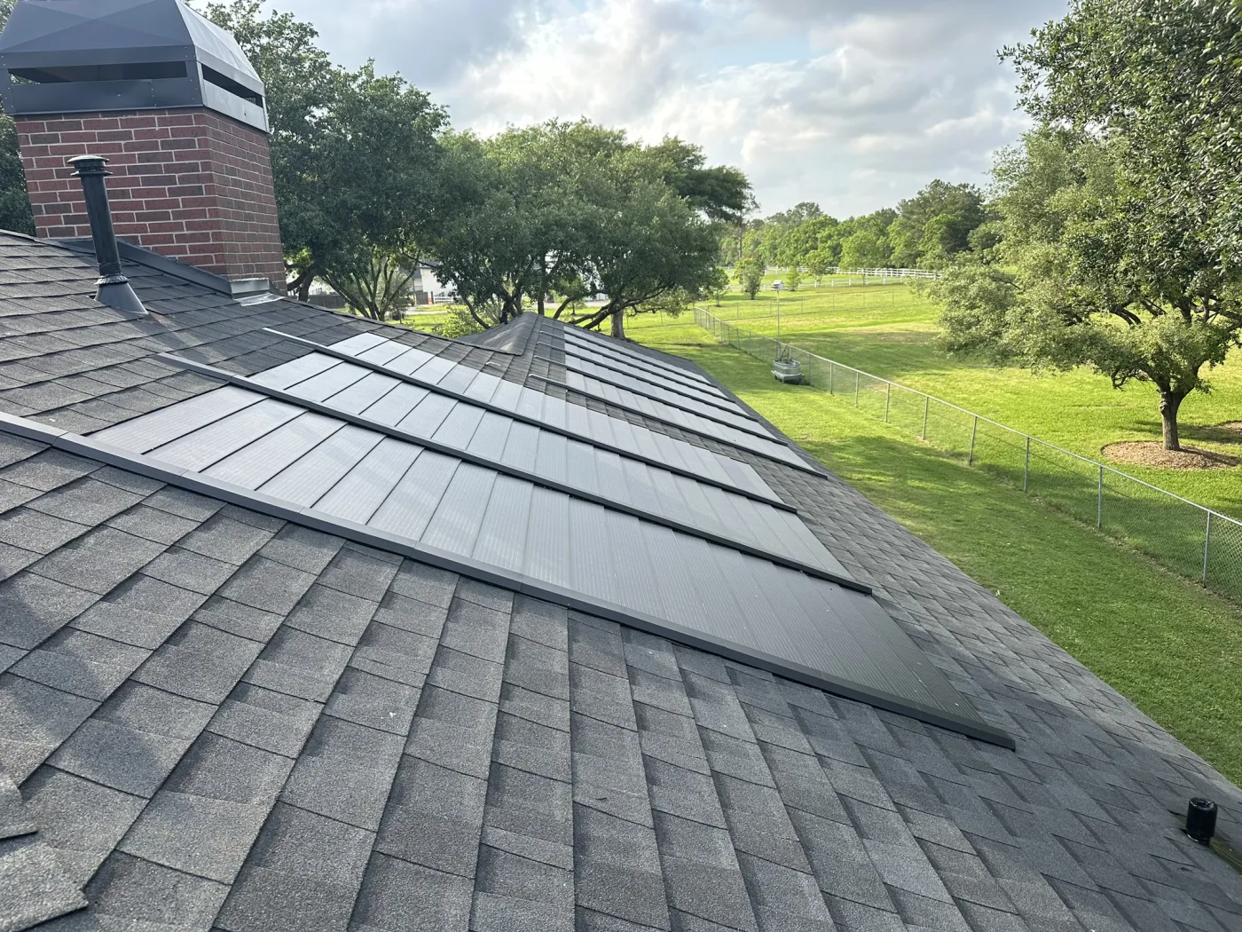 Low profile solar array like tesla but not GAF Timberline Solar 25year Warranty Houston tx