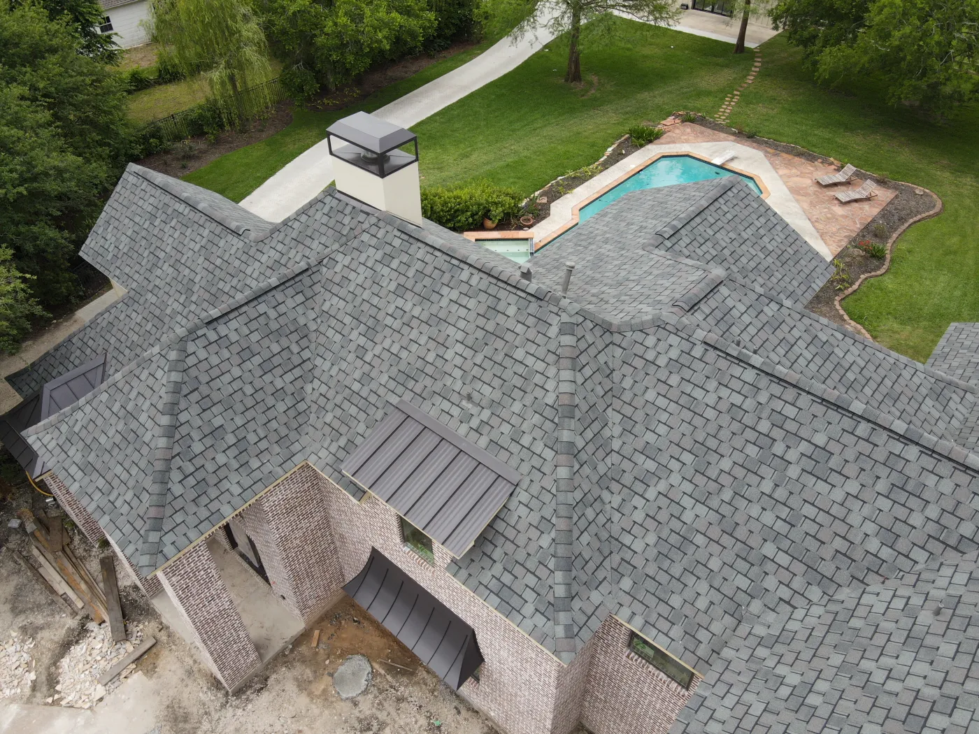 Roof replacement certainteed lifetime roof system with metal accents near alvin tx