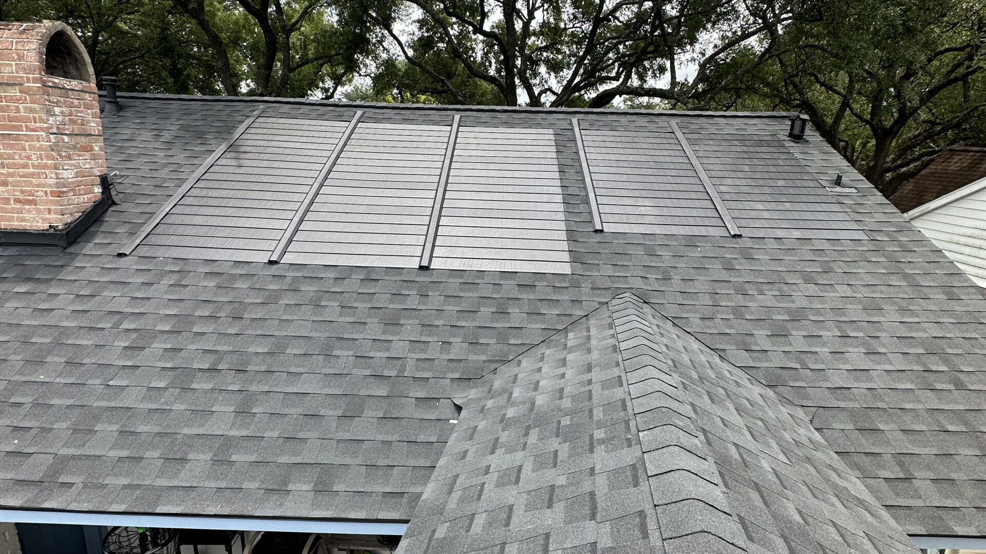 Closeup of GAF solar shingles on a roof 